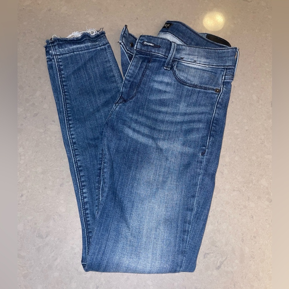 Express medium wash skinny mid rise jeans size 2